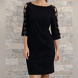 Fervente Elegant Black Dress with Gold Accents size 38
